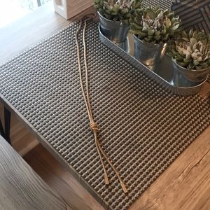 Asymmetrical long gold necklace